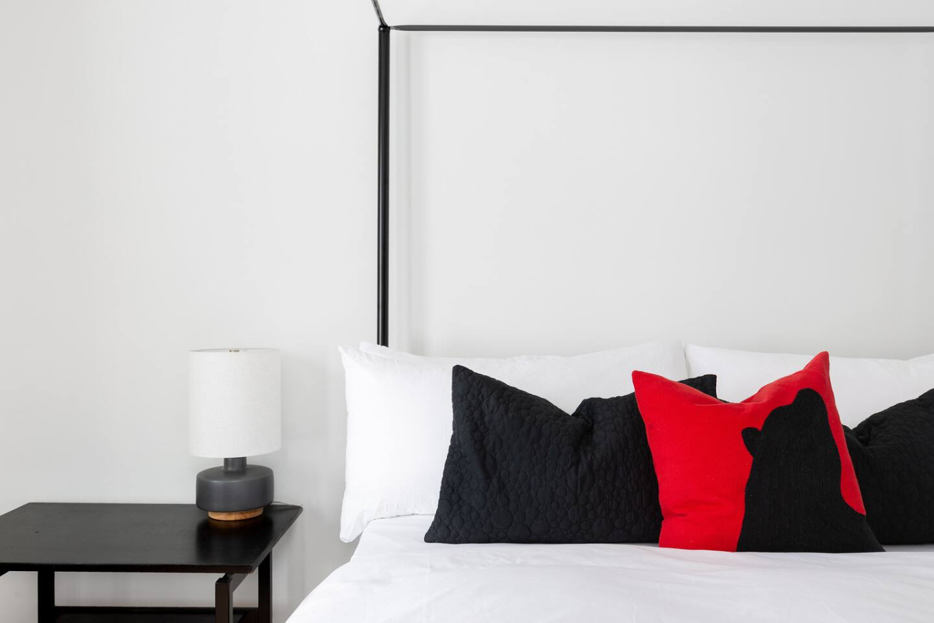 Elegant bedroom with four-poster bed